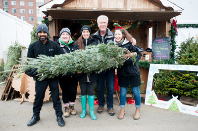 Nothing gives Forests Ontario staff a bigger smile than promoting the sale of real, Ontario-grown Christmas Trees! (Right to left: Ravi Singh; Stephanie Prince; Andrea Curley; Rob Keen, CEO; and Ruth Hall) (CNW Group/Forests Ontario)