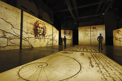 Guests are immersed in Leonardo's works through a multisensory cinematic experience using state-of-the-art SENSORY4 technology. High-definition motion graphics and surround sound, combined with authentic photography and video footage, saturate the gallery in a breathtaking display of the codices, computer-generated imagery, and art. (c)Grande Exhibitions