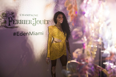 Winnie Harlow in the shadows of the HyperNature tree by Perrier-Jouët