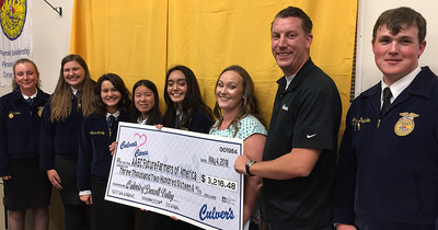 Culver's presents a check to an FFA chapter in Arizona.