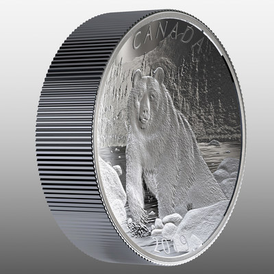 La pice biconcave en argent fin de la Monnaie royale canadienne - Nature indompte : Ours brun (angle revers) (Groupe CNW/Monnaie royale canadienne)