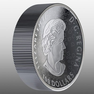 La pice biconcave en argent fin de la Monnaie royale canadienne - Nature indompte : Ours brun (angle avers) (Groupe CNW/Monnaie royale canadienne)