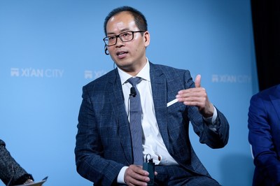 Mr. Li Dong, an urban planning expert from Xi’an China addresses the New York Times Cities for Tomorrow Conference in New Orleans on December 7, 2018. [Photo Credit: Mike Cohen for The New York Times]