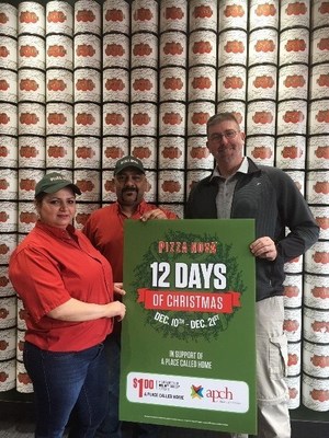 From left to right: Pizza Nova, Franchisee Khusrau Neikayen “Sam” and his wife Zlata Neikayen along with David Tilley, Manager of Fund Development and Operations, A Place Called Home kicking off 12 Days of Christmas live at Pizza Nova Lindsay on the first day of 12 Days of Christmas. (CNW Group/Pizza Nova)