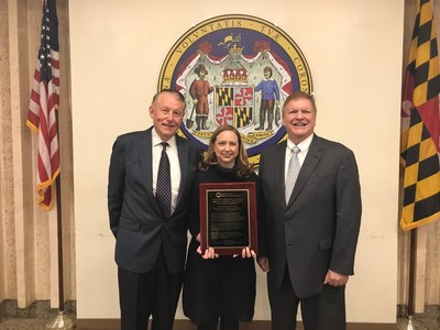 Christine Nizer (center MDOT MVA Administrator) and  MDOT Secretary Pete K. Rahn (right) accepted the award from Keeping Identities Safe Executive Director Brian Zimmer (left).