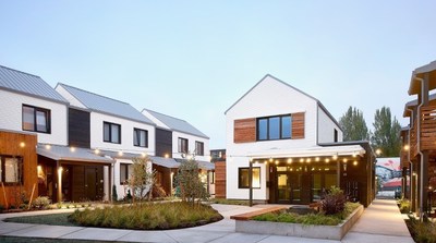 Tillamook Row, a 16-unit Zero Energy community in Portland, Oregon designed and built by Green Hammer, produces as much energy as it consumes. It's proof that zero carbon buildings are attainable in today's marketplace. Photo by Bill Purcell Photography