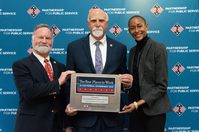 WASHINGTON, D.C. (Dec. 12, 2018) (From L to R) Deputy Director, Field Operations Gary Hattal, Acting Director Rich Giacolone and Change Management Advisor Traci Coddington accept a plaque recognizing the Federal Mediation and Conciliation Service (FMCS) as the Best Place to Work in the Federal Government (Small Agency category) for 2018. (Photo courtesy of Partnership for Public Service)