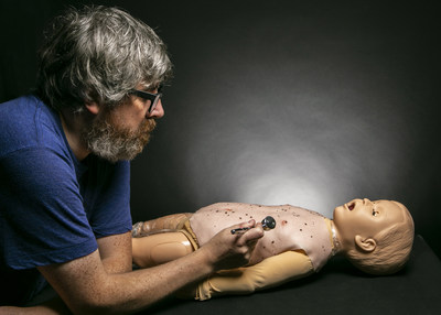 Neil Morrill, SPFX Makeup Artist and CMU Instructor, putting on the finishing paint touches. (CNW Group/CMU College)