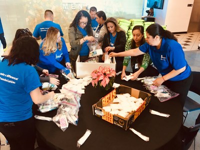 Pictured: SoCalGas employee volunteers assembling toiletry kits for homeless individuals and families who attend the luncheon.