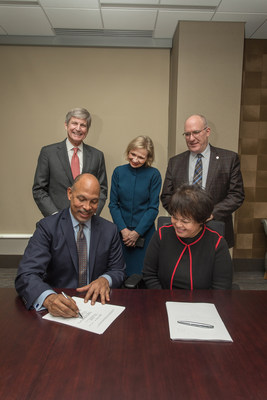 MACON, G.A. (Dec. 19, 2018) -- Eugene A. Woods, president and CEO of Atrium Health, and Ninfa M. Saunders, president and CEO of Navicent Health, are joined by board members and staff from both organizations, to celebrate the signing of the definitive agreement for the organizations’ strategic combination. As a result of this strategic combination, Navicent Health will be a hub for Atrium Health for central and south Georgia.