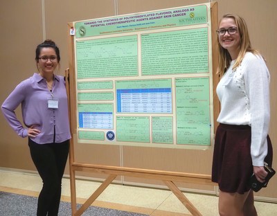 Two students display poster at Sekisui sponsored APTEC 2018