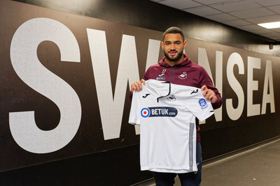 Cameron Carter-Vickers of Swansea City holding a home shirt with a new sponsor, Events DC, during the Sky Bet Championship match between Swansea City and Sheffield Wednesday at the Liberty Stadium , Swansea, Wales, UK. Saturday 15 December 2018