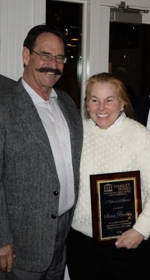 Michael and Susan Brodsky accepting an award for Hamlet Homes in Salt Lake City, Utah.