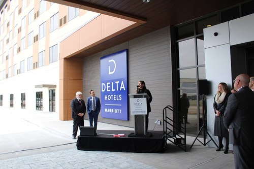 Stacy Martin, Managing Director of the Delta Hotel by Marriott Dallas Allen & Watters Creek Convention Center speaks at the ribbon cutting of the first Delta Hotels hotel in the Dallas area.