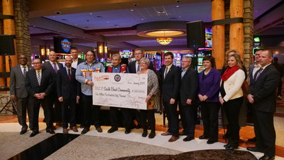 Representatives from Pokagon Band and Four Winds Casinos present a check for $1.56 million to several South Bend area non-profit organizations. The funds are part of a voluntary local agreement with the City of South Bend. Four Winds South Bend, celebrating its first anniversary this month, is the fourth owned and operated by The Pokagon Band, and is the only tribal-owned casino in Indiana.