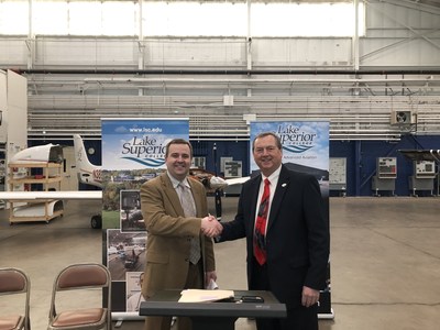 Pictured left to right, Ryan Goertzen, Vice President of Aviation Workforce Development for AAR, and Dr. Patrick Johns, President of Lake Superior College.