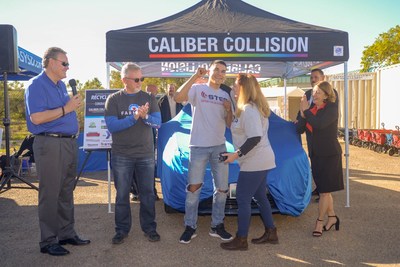 Representatives from Farmers Insurance, the National Auto Body Council (NABC), Support the Enlisted Project (STEP), and Caliber Collision donate a refurbished vehicle to a San Diego-area Marine on January 24, 2019 at the Armed Services YMCA San Diego.