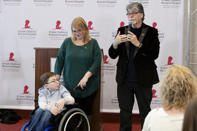 St. Jude patient Caleb and his mother Kelly help honor musician Randy Owen for his dedication to the life-saving mission of St. Jude Children's Research Hospital with a plaque naming a room in his honor during a press conference at the Country Cares seminar at St. Jude Children's Research Hospital on Friday, January 25, 2019.