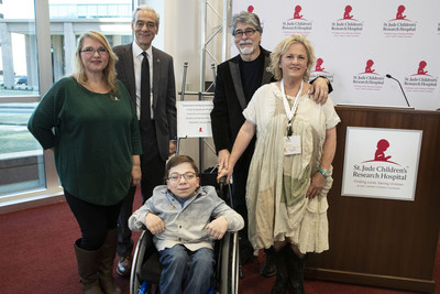 Musician Randy Owen, his wife, ALSAC CEO Richard Shadyac, Jr., St. Jude patient Caleb and his mom Kelly stand by a plaque honoring Owen for his dedication to the life-saving mission of St. Jude Children's Research Hospital during a press conference at the Country Cares seminar at St. Jude Children's Research Hospital on Friday, January 25, 2019.