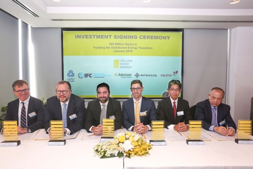 The signing ceremony took place in Dubai, celebrating Yellow Door Energy raising $65 million from leading global investors. (PRNewsfoto/Yellow Door Energy)