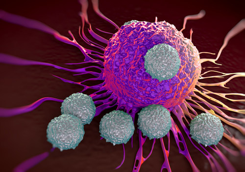 Illustration of T cells attacking cancer cell