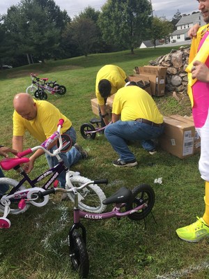 New Way employees put together bikes for charity as a team building exercise at our annual Fun Day.
