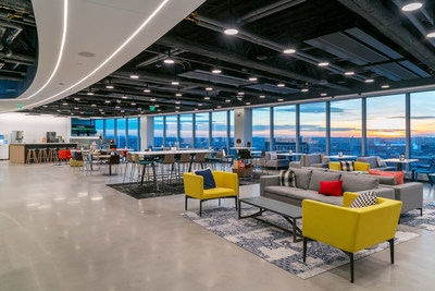 On the top floor of PTC’s new global headquarters, a large collaborative space called “The Common” provides a variety of seating for both employees and customers. A large, open stair with a glass head-house connects The Common to the landscaped roof deck with outdoor seating. Photo credit: Warren Patterson Photography.