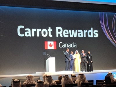 The Carrot Rewards team accepts the 2019 Edge of Government Award on stage in Dubai. (CNW Group/Carrot Rewards)
