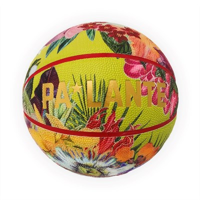 The limited Artist Edition ($210, chartreuse basketball with floral prints), titled "Pa'Lante” (2018) is hand-signed by Rolón and includes a wood embossed ring stand and signed letter of authenticity. Image Courtesy Carlos Rolón Studio & Project Backboard.