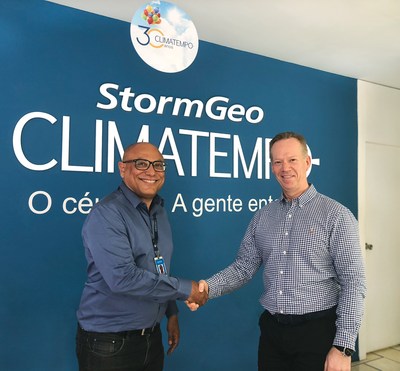 Carlos Magno do Nascimento, Climatempo founder and president (left), and  Per-Olof Schroeder, StormGeo CEO, (right) shake hands upon agreeing to join forces to create Latin American weather intelligence leader. StormGeo acquires majority stake in Climatempo.