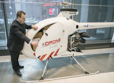 Tony Di Benedetto, CEO of Drone Delivery Canada opens the cargo bay door of his company's newest, largest and farthest range cargo delivery drone, the Condor, in Toronto, Ont. on Tuesday, February 19, 2019. The 7 metre long Condor has a payload capacity of 180 kilograms and a potential travel distance of up to 200 kilometres. THE CANADIAN PRESS IMAGES/J.P. Moczulski (CNW Group/Drone Delivery Canada)