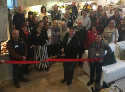 American Legend Homes celebrated its expansion into the Northern Colorado market with a Berthoud Chamber of Commerce ribbon-cutting event. Cutting the ribbon is Don Long, vice president - Colorado.