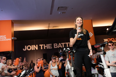 Gabriele Grunewald speaks about her story at a Cycle for Survival event in Seattle on January 27. Brave Like Gabe, the foundation established by Grunewald, initiated a $100,000 donation challenge in February 2019 to amplify the fundraising efforts of the Cycle for Survival community. 100 percent of every dollar raised by Cycle for Survival funds rare cancer research led by Memorial Sloan Kettering Cancer Center.