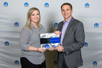 Brittany Sturdivant, a service advisor at Hebert’s Town & Country Chrysler Dodge Jeep® Ram in Shreveport, Louisiana, accepts her Mopar “Top Advisor” award from Steve Beahm, Head of Parts and Service (Mopar) and Passenger Car Brands, FCA – North America. Sturdivant was one of a select group of 30 to receive the Mopar “Top Advisor” award.