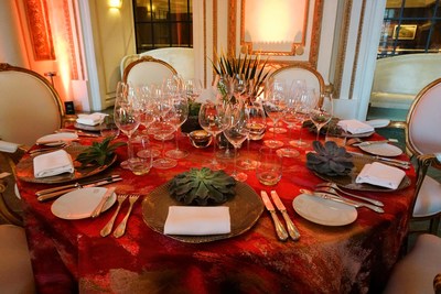 Tables designs featured succulents, cacti, and beautiful ruby red linens with brush strokes of painted metallic gold.