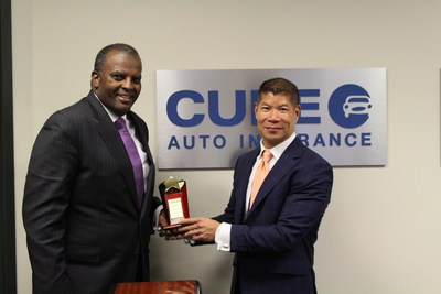 John Harmon, President and CEO of the African American Chamber of Commerce of New Jersey awards Eric Poe, COO of CURE Auto Insurance with the 'Economic and Social Justice Ally Award.' John Harmon, President and CEO of the African American Chamber of Commerce of New Jersey awards Eric Poe, COO of CURE Auto Insurance with the 'Economic and Social Justice Ally Award.'