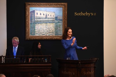 Sotheby's European Chairman and auctioneer, Helena Newman, hammers down Claude Monet's Venetian view for a record $36.2 million in London this week.  The bi-annual series of Impressionist, Modern and Surrealist Art sales in London brought a total of $143.6 million.