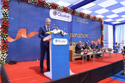 Quaker executives speak at the opening of the company's newest manufacturing plant in Dahej, India.
