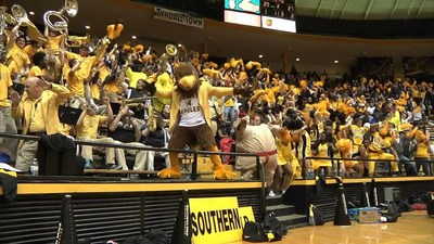 University of Southern Mississippi fans cheer for the Golden Eagles basketball team.  USM senior guard Cortez Edwards is a finalist for the 2019 C Spire Howell Trophy, which annually honors the top men's college basketball player in the Magnolia State. Fan voting will count for 10 percent of the vote total. - photo courtesy of USM Athletics