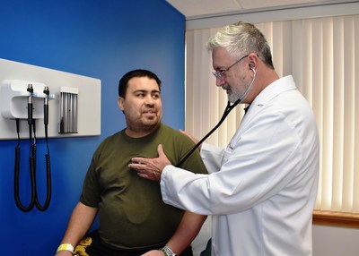 Three weeks after undergoing open-heart surgery to replace his aortic valve, Rolando Irizarry, 41, gets a check up from Dr. Joel Hardin, adult congenital heart disease cardiologist at St. Joseph’s Hospital in Tampa on March 4, 2019. In recognition of its expertise in serving adults with congenital heart disease, St. Joseph’s Hospital’s Adult Congenital Heart Program Earned Comprehensive Accreditation from the Adult Congenital Heart Association.