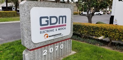 GDM signage proudly displays Ravenswood logo reflecting strategic partnership.