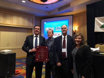 (from left to right) Chris Weikle, senior manager government affairs, Southwestern Energy; James Martin, director, West Virginia Department of Environmental Protection; Brett Loflin, vice president, regulatory affairs, Northeast Natural Energy; and Amy Dobkin, community relations manager, Southwestern Energy, accept an award from the West Virginia Department of Environmental Protection on behalf of Southwestern Energy.