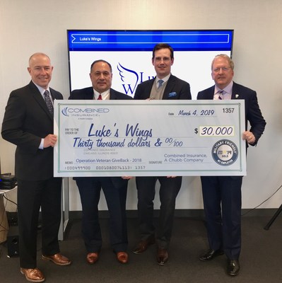 Combined Insurance leaders Bob Wiedower, Doug Abercrombie, and Tony O'Dierno presented a $30,000 check to Fletcher Gill, CEO of Luke's Wings.