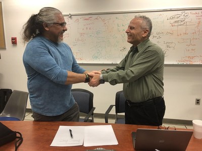 Carlos Art Nevarez from BPU Holdings pictured with Dr. Salim Hariri of SEVA Technology