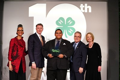 Clyde van Dyke, 18, of Johnson City, NY, (center), named as the 2019 National Youth in Action winner at the 2019 4-H Legacy Awards in Washington D.C. poses with TV personality, author and chef, Carla Hall, 4-H Board Chairman, Landel Hobbs, senior vice president of marketing for HughesNet, Peter Gulla, and Jennifer Sirangelo, president and CEO, National 4-H Council.