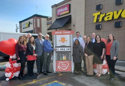 Pilot Flying J announces the amount raised in support of the American Heart Association’s “Life Is Why We Give™” campaign, presenting a total of $1,068,243 to the organization at a celebration on March 12 at the Pilot Travel Center on Strawberry Plains Pike near the company’s headquarters in Knoxville, Tennessee. Pilot Flying J and American Heart Association representatives pictured from left: Blair Ware, Bev Miller, David Markiewicz, Sarah MacPhail, Mike Rodgers, Pilot Flying J Founder and Chairman Jim Haslam, Meg Counts, Spencer Ross, Tim Wroblewski, Julie Taylor, Paul Duncan, Danica Powell and Mindy Savage.