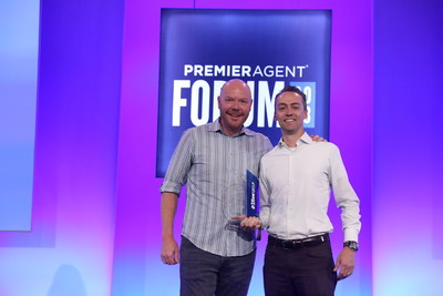 David Ness and Tim Aberle on stage at the Zillow Premier Agent Forum in Las Vegas receiving the award for #1 in the Country for Client Experience.