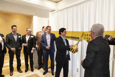 Dr. John Saw, Sprint chief technology officer cuts the ribbon at Sprint 5G Experience located in Overland Park, Kan.