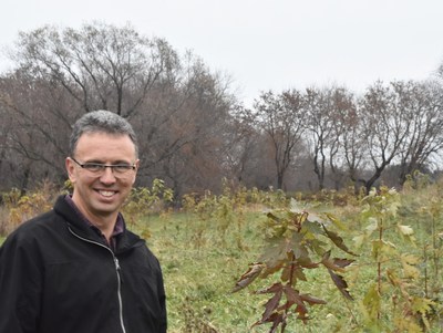 André Brisson with his young forest. (CNW Group/Forests Ontario)