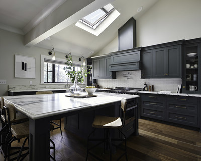 VELUX skylights bring natural light and fresh air to this kitchen designed by Emily Henderson.